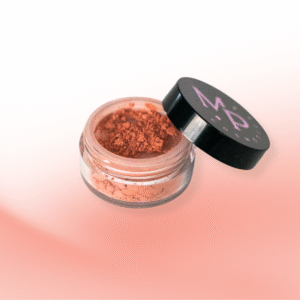 Oranž mineraalne põsepuna toonis "Õhtu puna" musta kaanega potsikus.