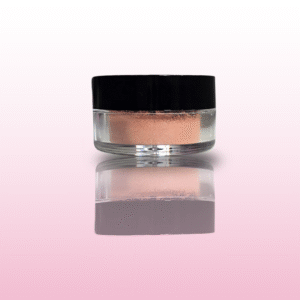 Mineraalne heleroosa pulberlauvärv toonis "Printsessipidu" ümara musta kaanega potsikus.